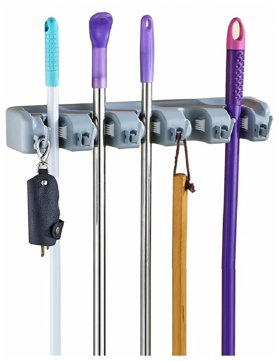 фото Универсальный настенный держатель для швабр, щеток, салфеток, хозяйственного инвентаря