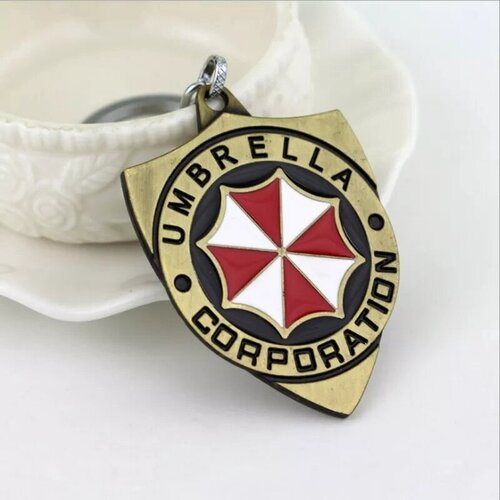 Брелок, коричневый umbrella corporation cadou evil корпорация амбрелла каду