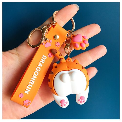 фото Брелок на ключи с браслетом кошачья попка / лапки оранжевый plush story