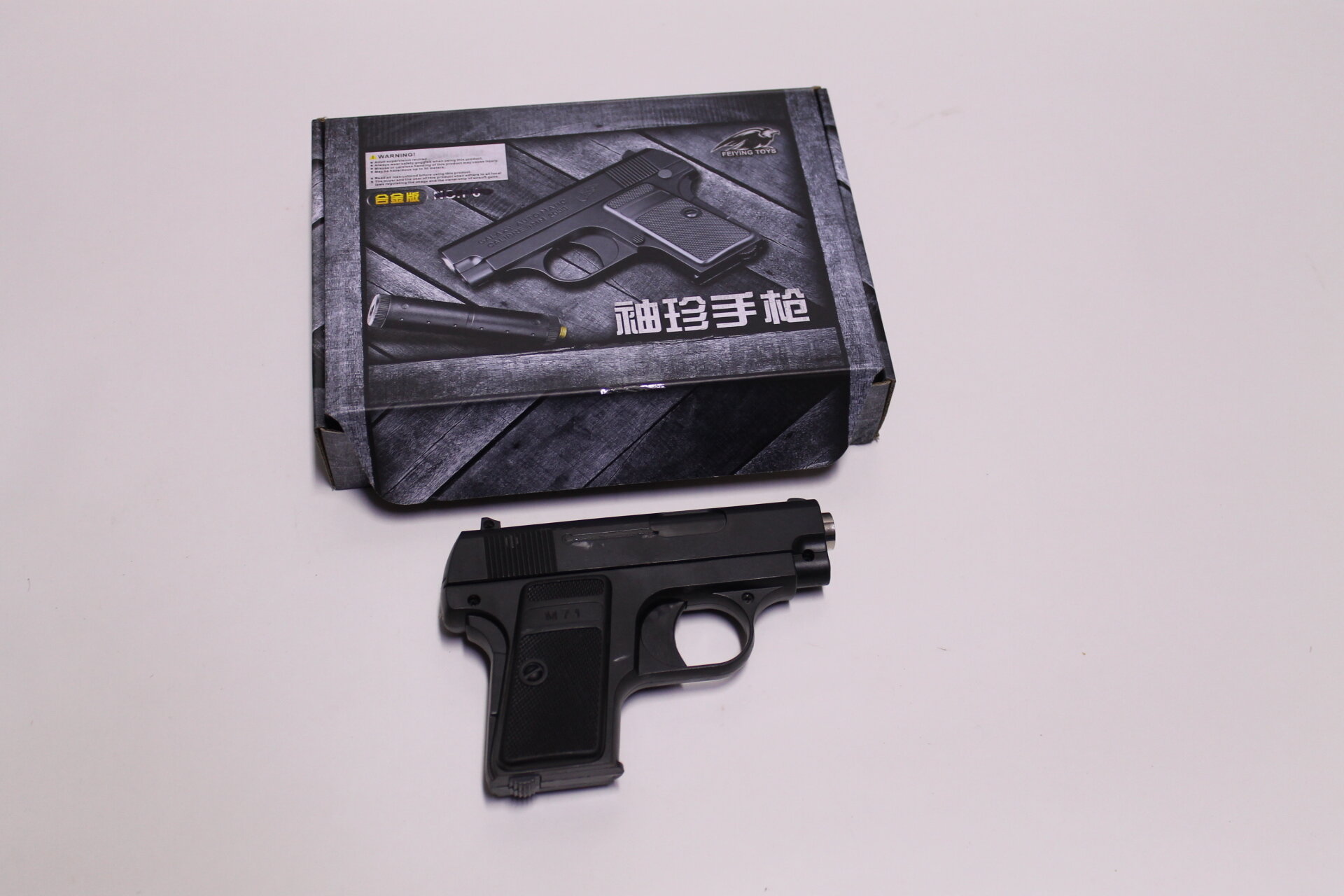 Детский механический пистолет с пульками Colt mini NO. P6