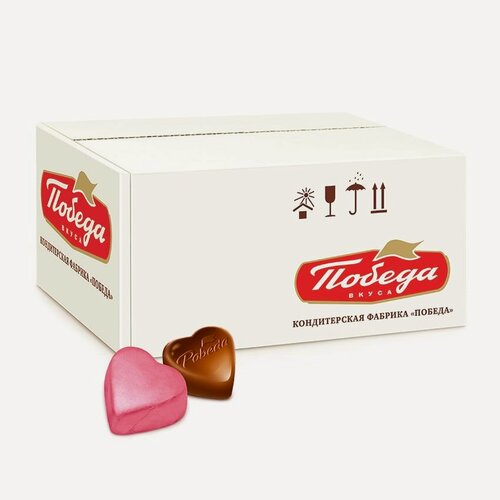 Изображение товара Конфеты Победа вкуса шоколадные с ореховым кремом "Сердечки" в розовой фольге, 2000г