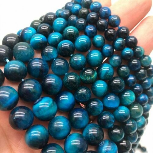 Каменные бусины Тигровый глаз тонированный голубой шарик гладкий 8 мм длина нити 38 см 950₽