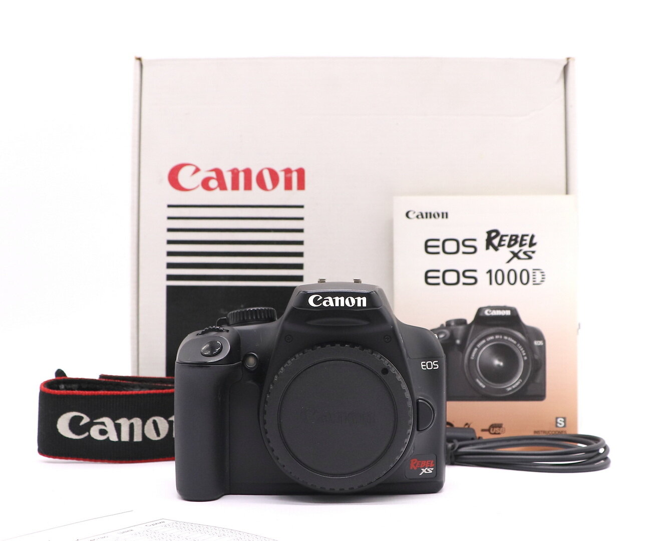 Canon EOS 1000D body в упаковке (пробег 12500 кадров)