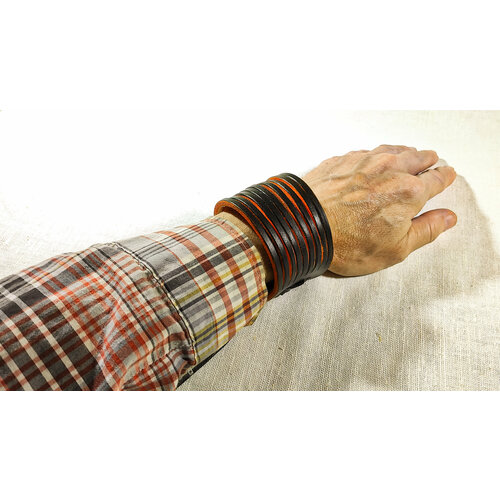 фото Браслет кожаный ручной работы "пружинка черная - оранжевая 9 полос" хельга шванцхен leatherca