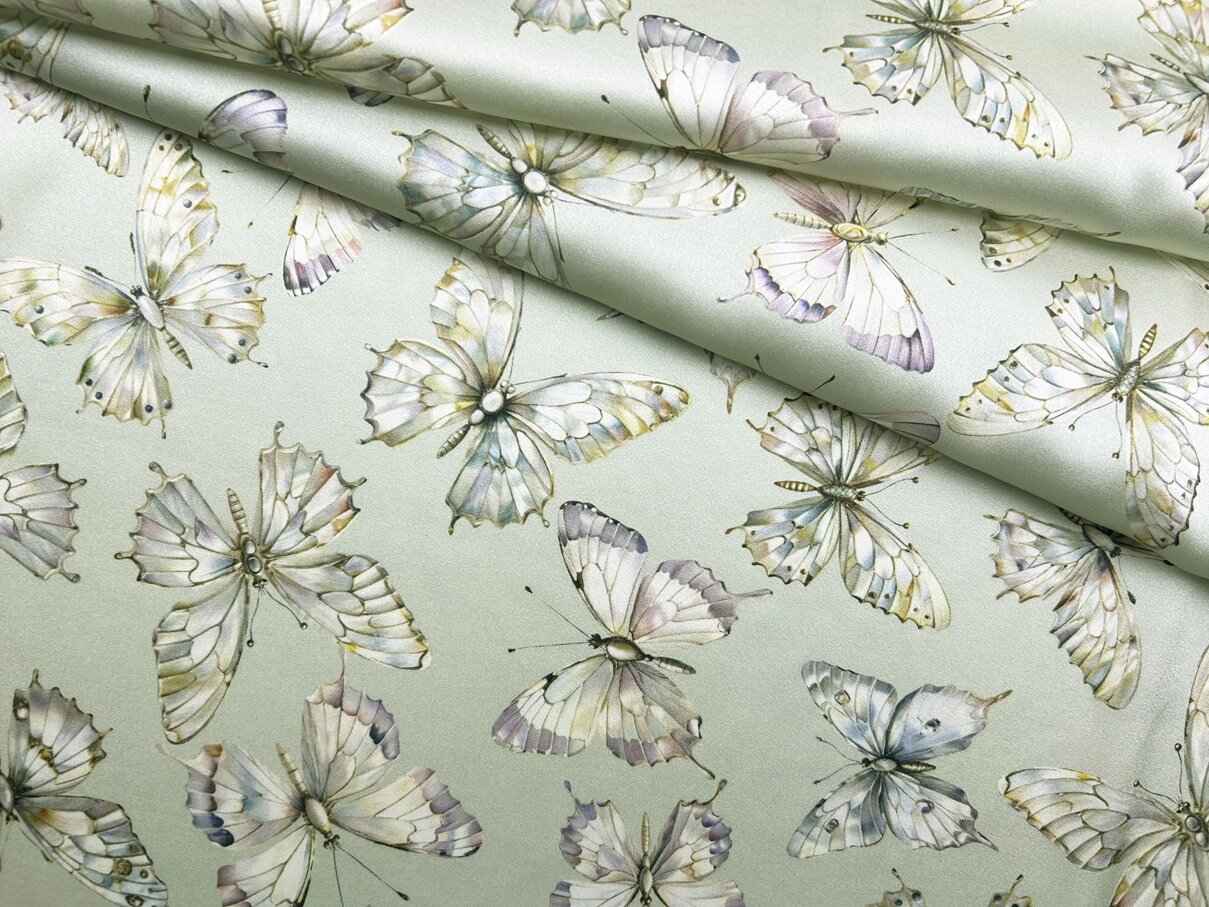 Ткань Шёлк атласный бледно-фисташкового цвета с перламутровыми бабочками 46538