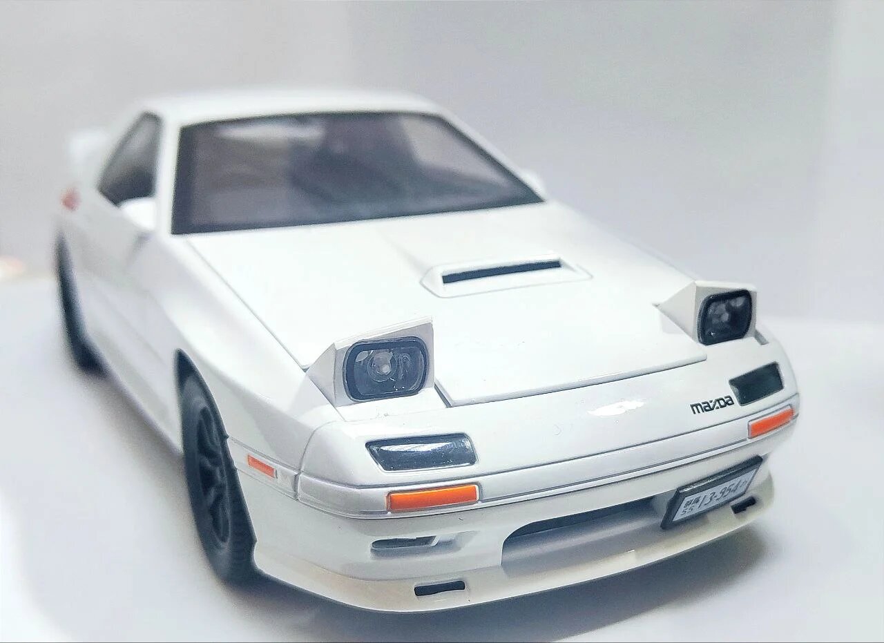 Машинка игрушка Mazda GTR RX7 спорткар металлическая 1:24 с световыми и звуковыми эффектами