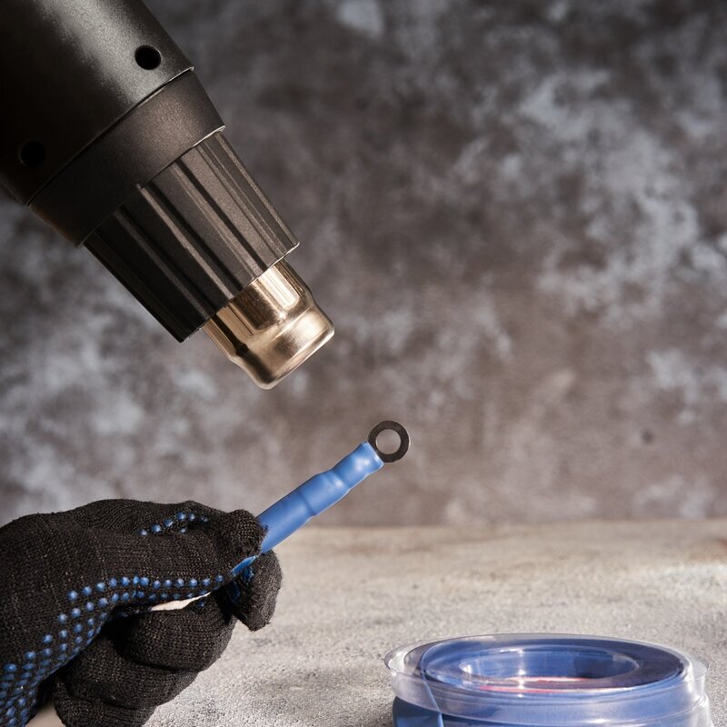 Термоусадочная синяя трубка REXANT 10.0/5.0 мм для проводов, катушка 2.44 м в многоразовом боксе