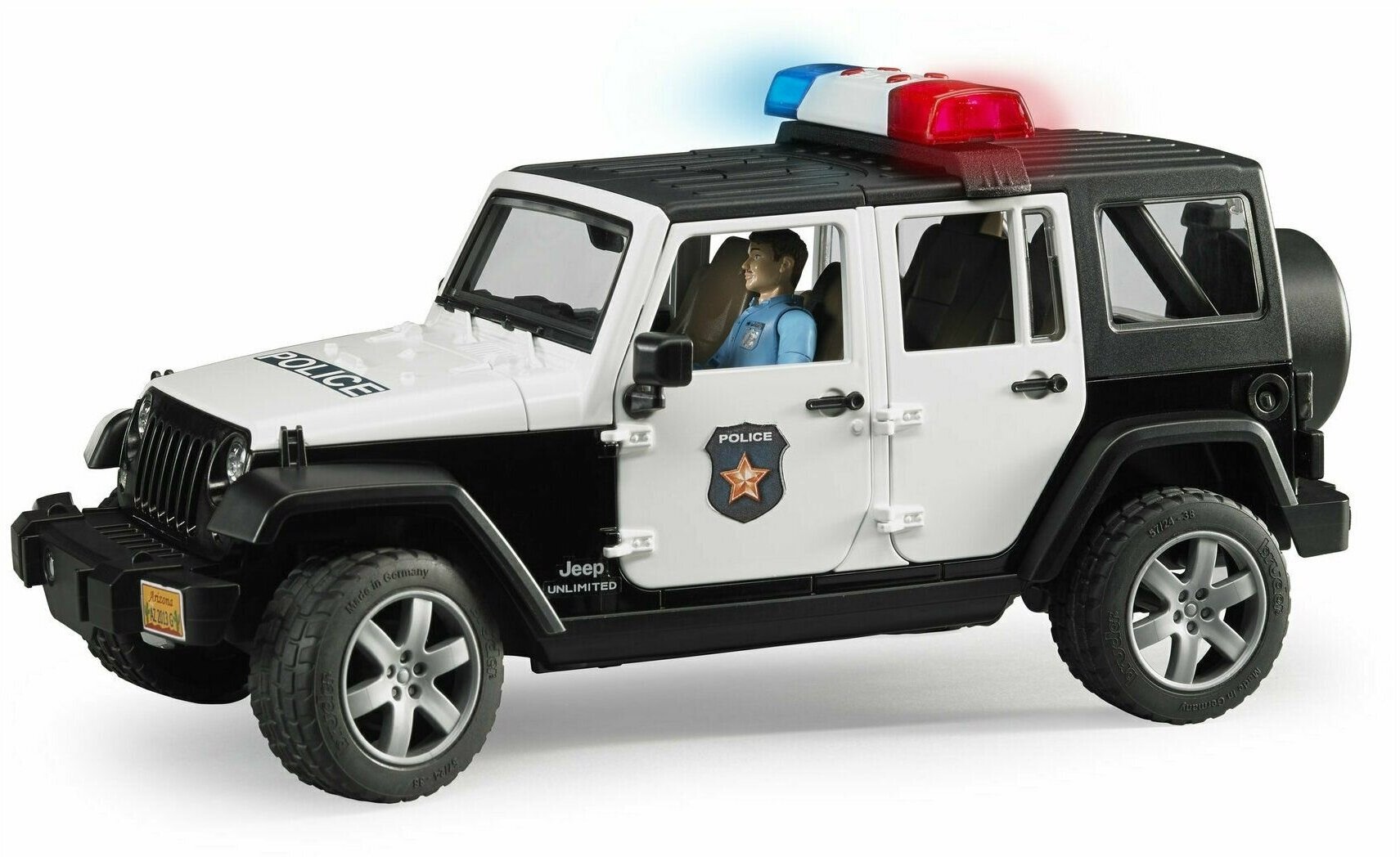 Машинка Bruder Внедорожник Jeep Wrangler Unlimited Rubicon Полиция с фигуркой