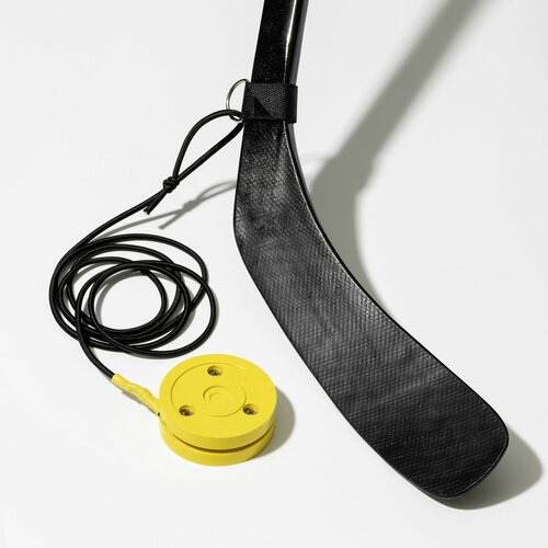 Шайба с возвратной пружиной для дриблинга желтая Bulldog Hockey