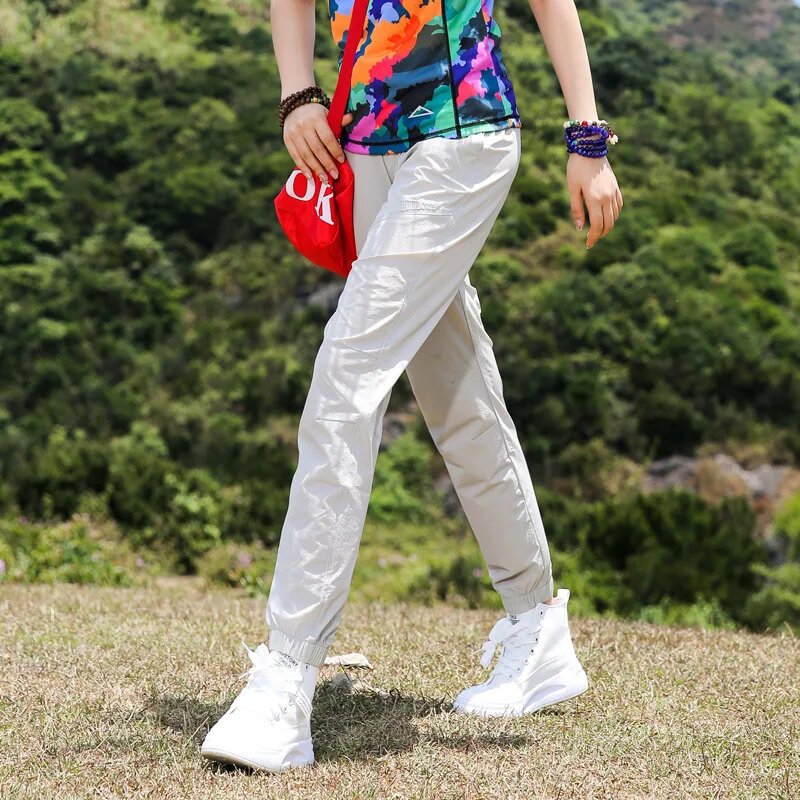 Брюки женские быстросохнущие для занятий спортом на открытом воздухе тонкие дышащие эластичные повседневные штаны одежда для походов рыбалки работы на лето White XXXL Женский