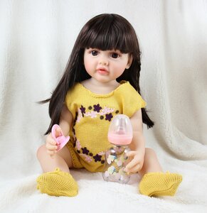 Фото Виниловая кукла Реборн (Reborn Dolls) - Девочка в желтом свитере (56 см)