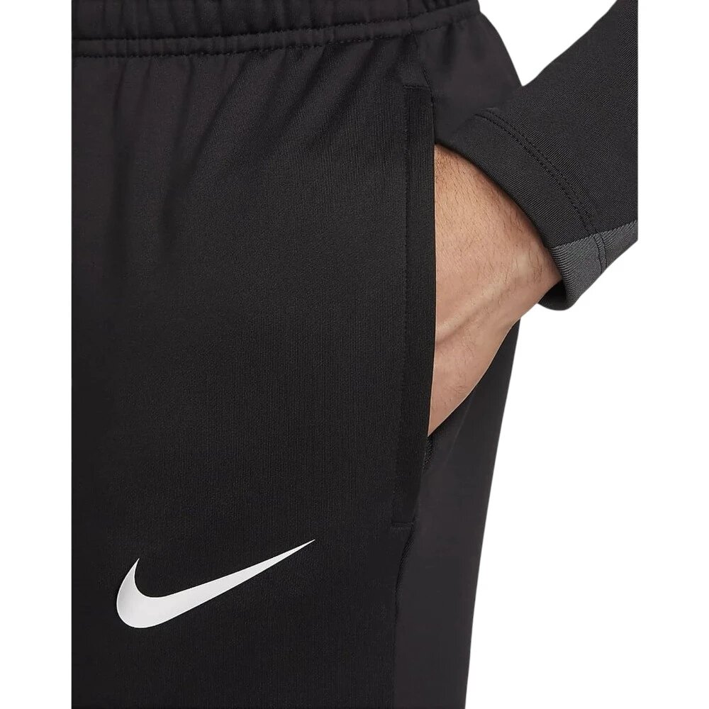 Брюки NIKE, размер M, черный — фото 1