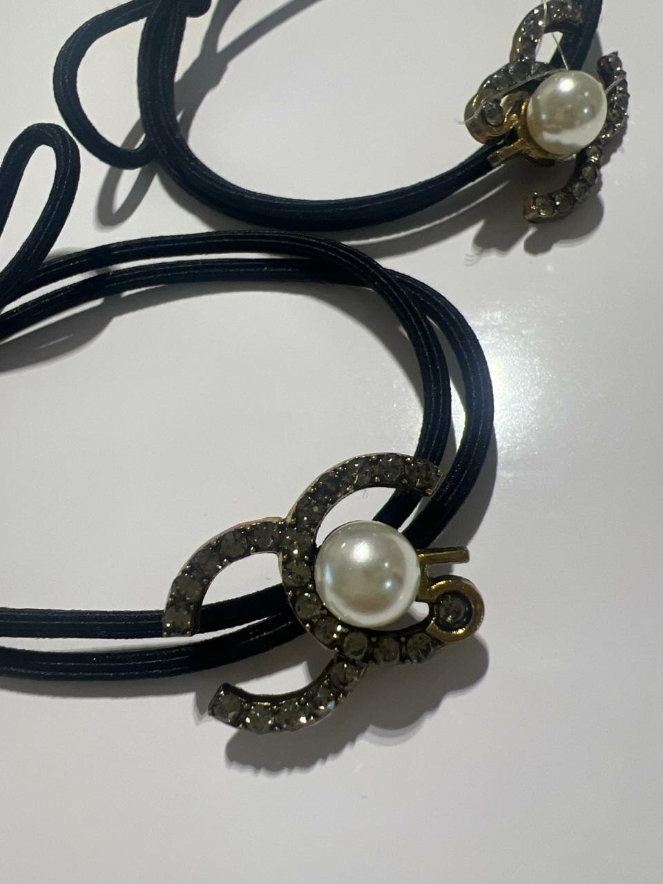 Резинка для волос с Чорны бантом и стразами