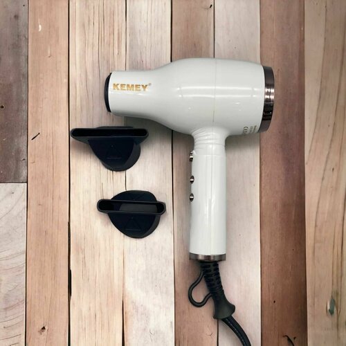 Фен для волос Kemei с насадками и функцией ионизации 113100₽