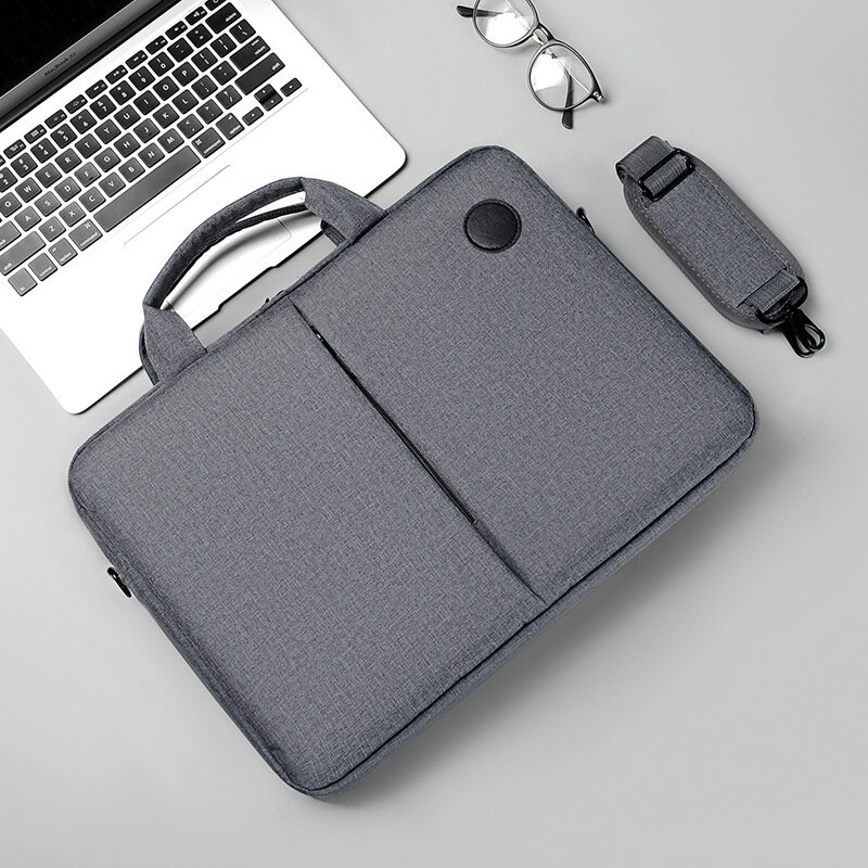 Сумка для ноутбука 15.6 дюймов цвет серый Размер сумки : Ширина 41См Глубина 6См Высота 30См Длина плечевого ремня: 120См