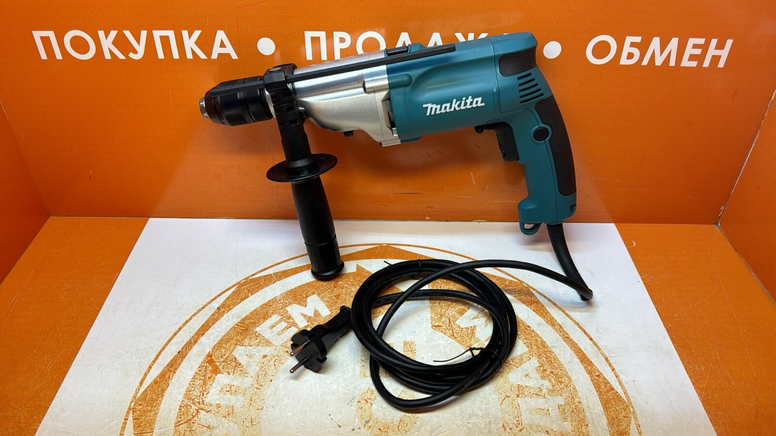 Ударная дрель Makita HP2051, 720 Вт