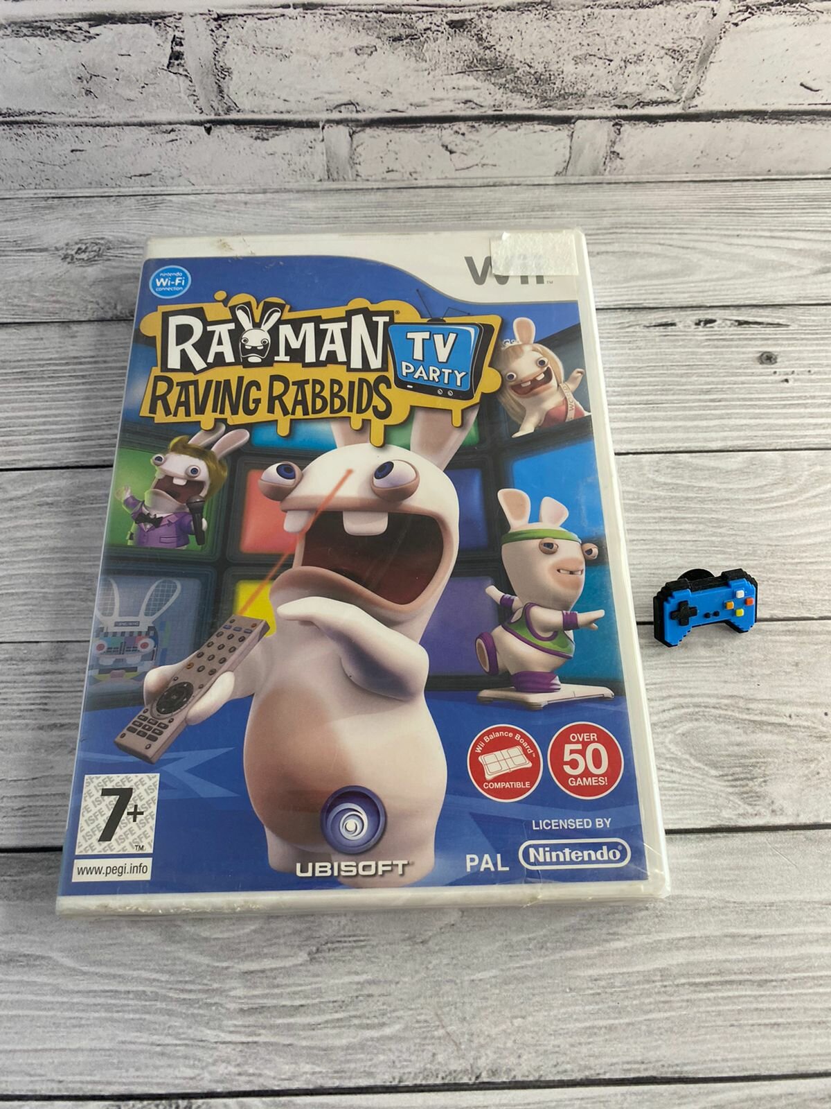 Диск игровой Rayman Raving Rabbids TV Party для Nintendo Wii лицензионный (англ. версия)