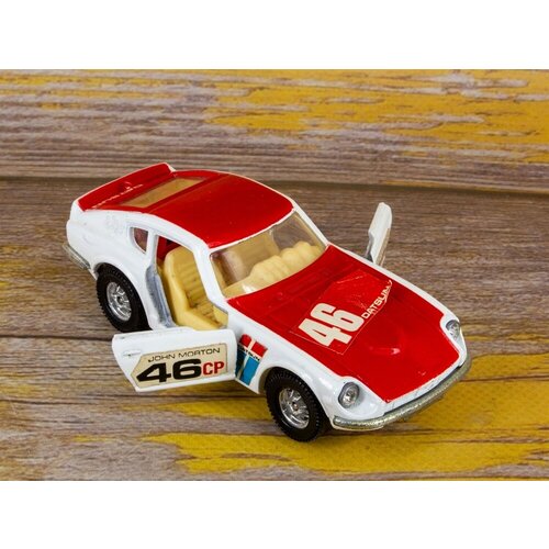 Модель автомобиля Nissan Datsun 240 Z Corgi Toys белый/красный 1:43