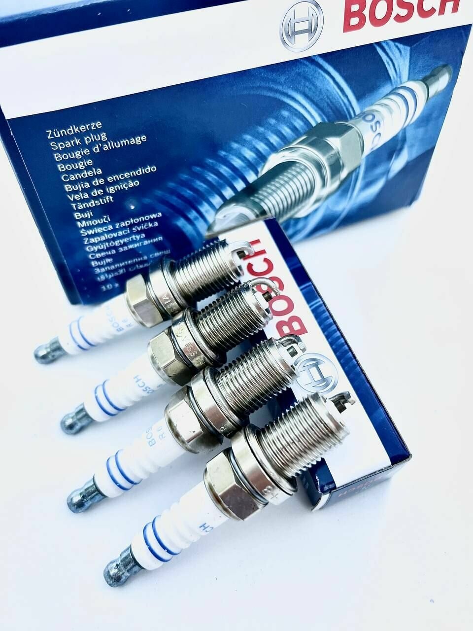 Комплект свечей зажигания Bosch 0242235666 FR7DC+ 4 штуки — фото 3