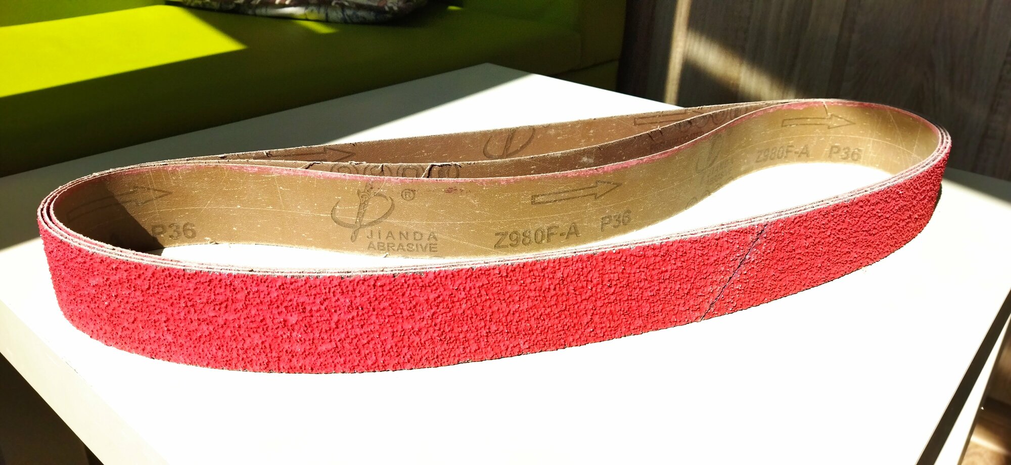 Лента шлифовальная абразивная керамическая для гриндера Jianda abrasive Р36 50х1250 1шт. — фото 3