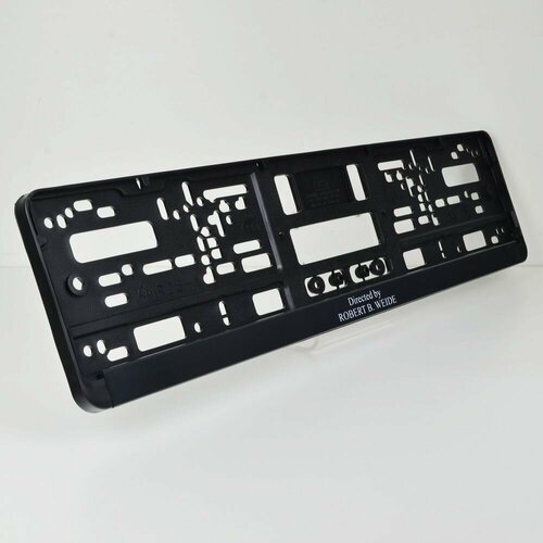 Directed by Robert B. Weide. Комплект из двух рамок для госномера с надписью.