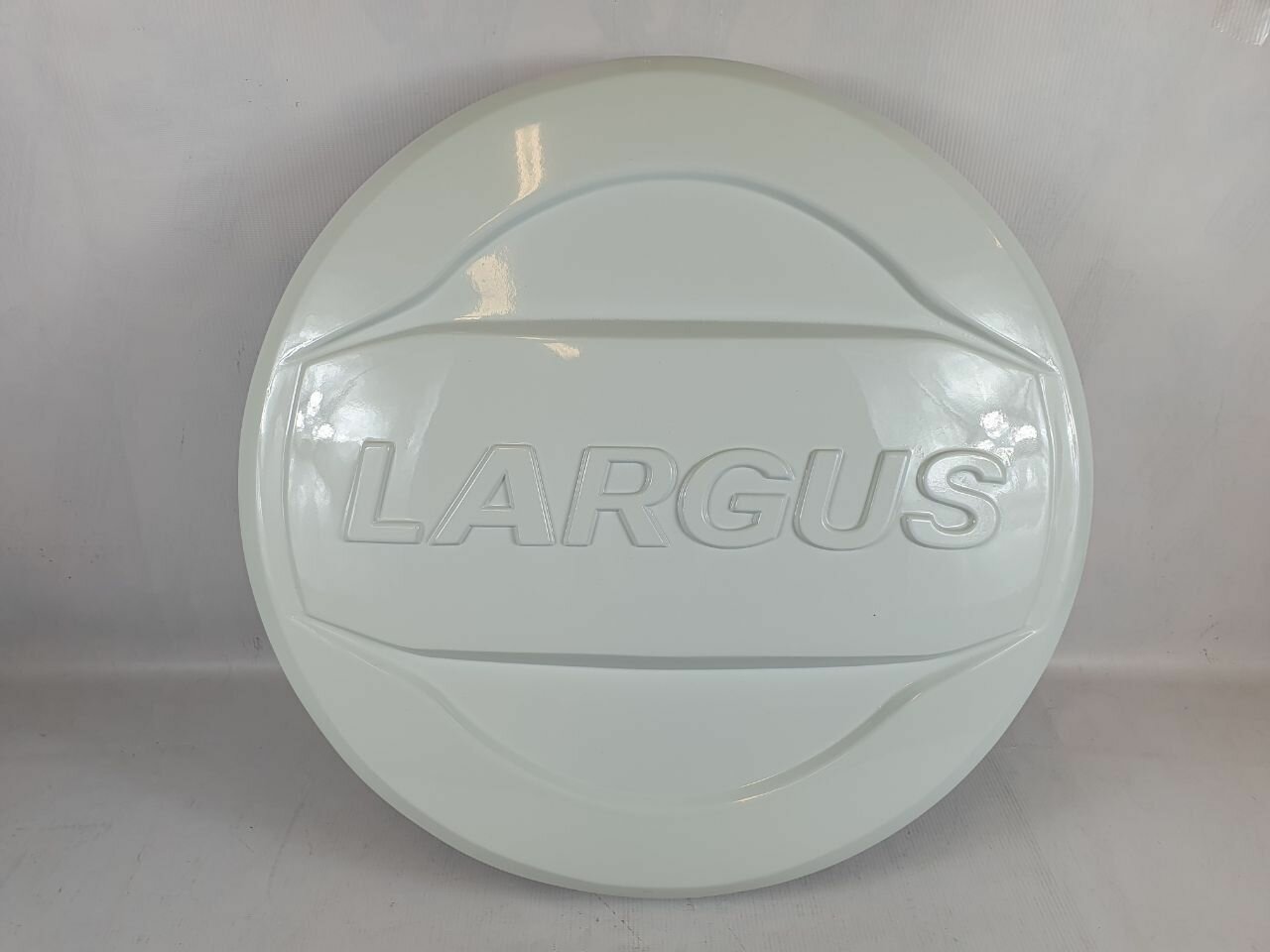 фото Колпак запасного колеса Lada Largus белый (ледник)