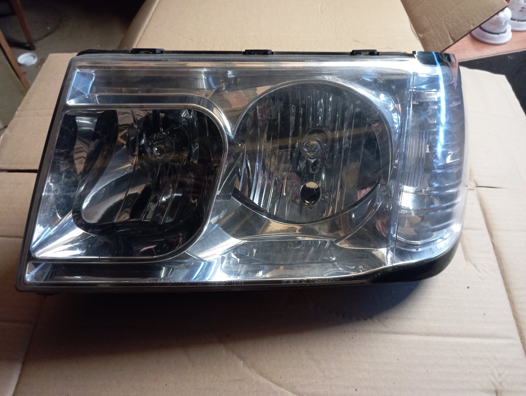 Лендкрузер 100фара правая.