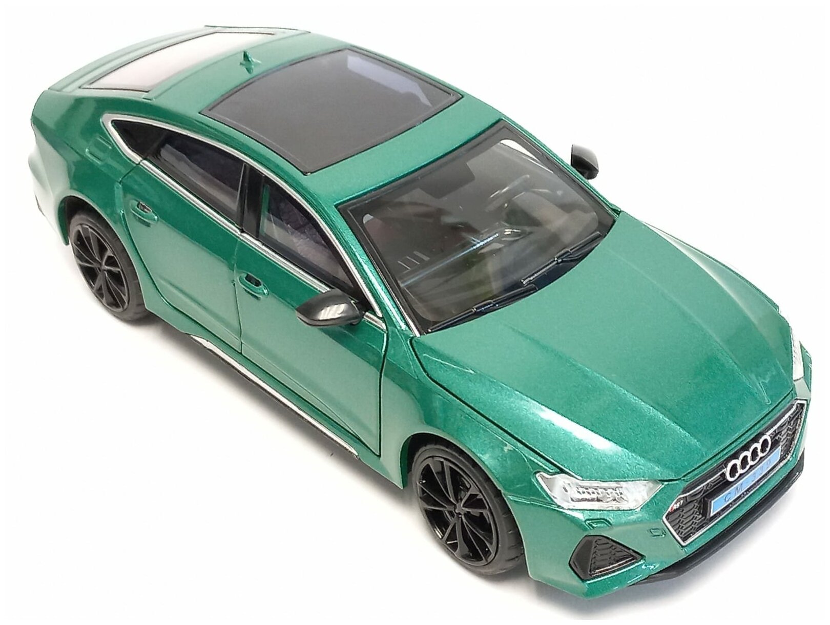 Машинка Audi RS 7 с клаксоном металлическая 1:24 со светом и звуком, цвет зеленый