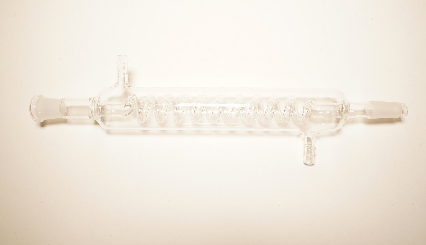 фото Стеклянный спиральный дистиллятор с наружным охлаждением, длина рубашки 200 мм, шлифы 14/23