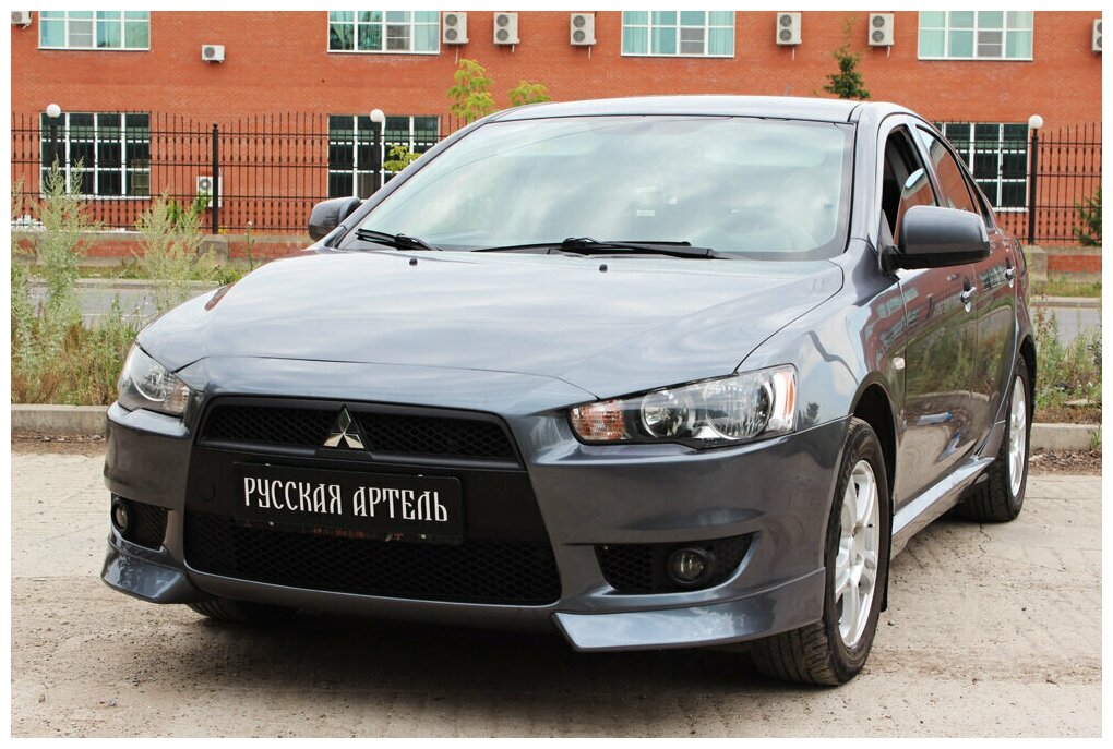 Накладка на передний бампер клыки Mitsubishi Lancer X 2007-2010