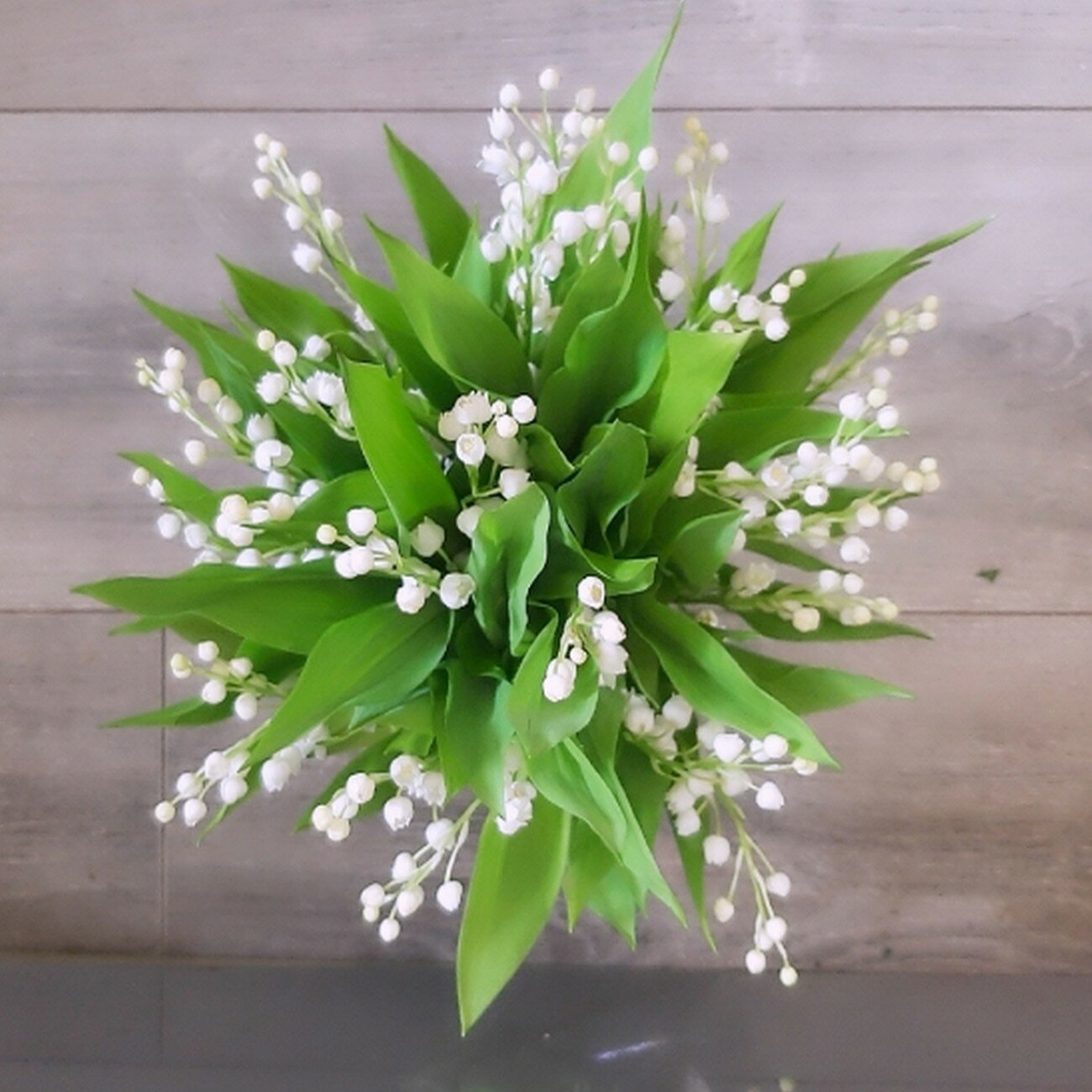 Букет цветов "11 Ландышей" 11 ландышей высота 20см аквабокс