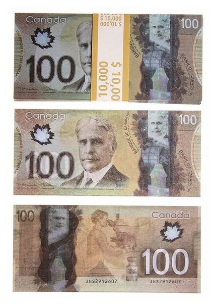 Пачка купюр 100 канадских долларов