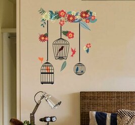 Настенная декоративная интерьерная наклейка "Певцы". Три клетки с птичками и цветы. Размер композиции на стене 44 на 57 см. Размер листа 32 на 58 см.