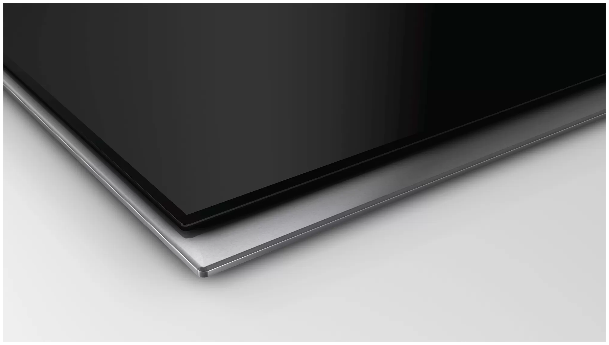 Индукционная варочная панель NEFF N43TD20N0, цвет панели черный, цвет рамки серебристый - фотография № 3