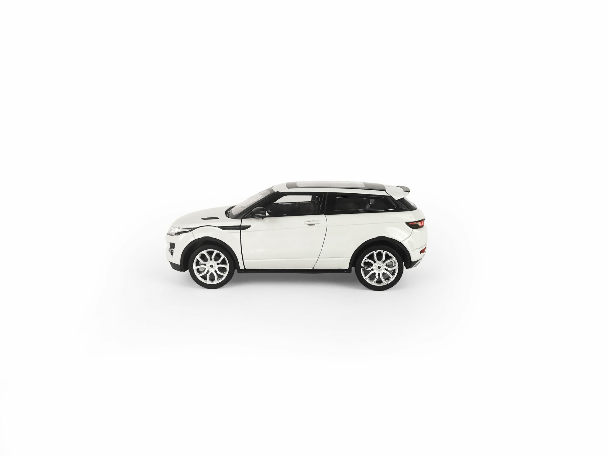 Машинка Welly 1:24 Range Rover Evoque белый - фото №7