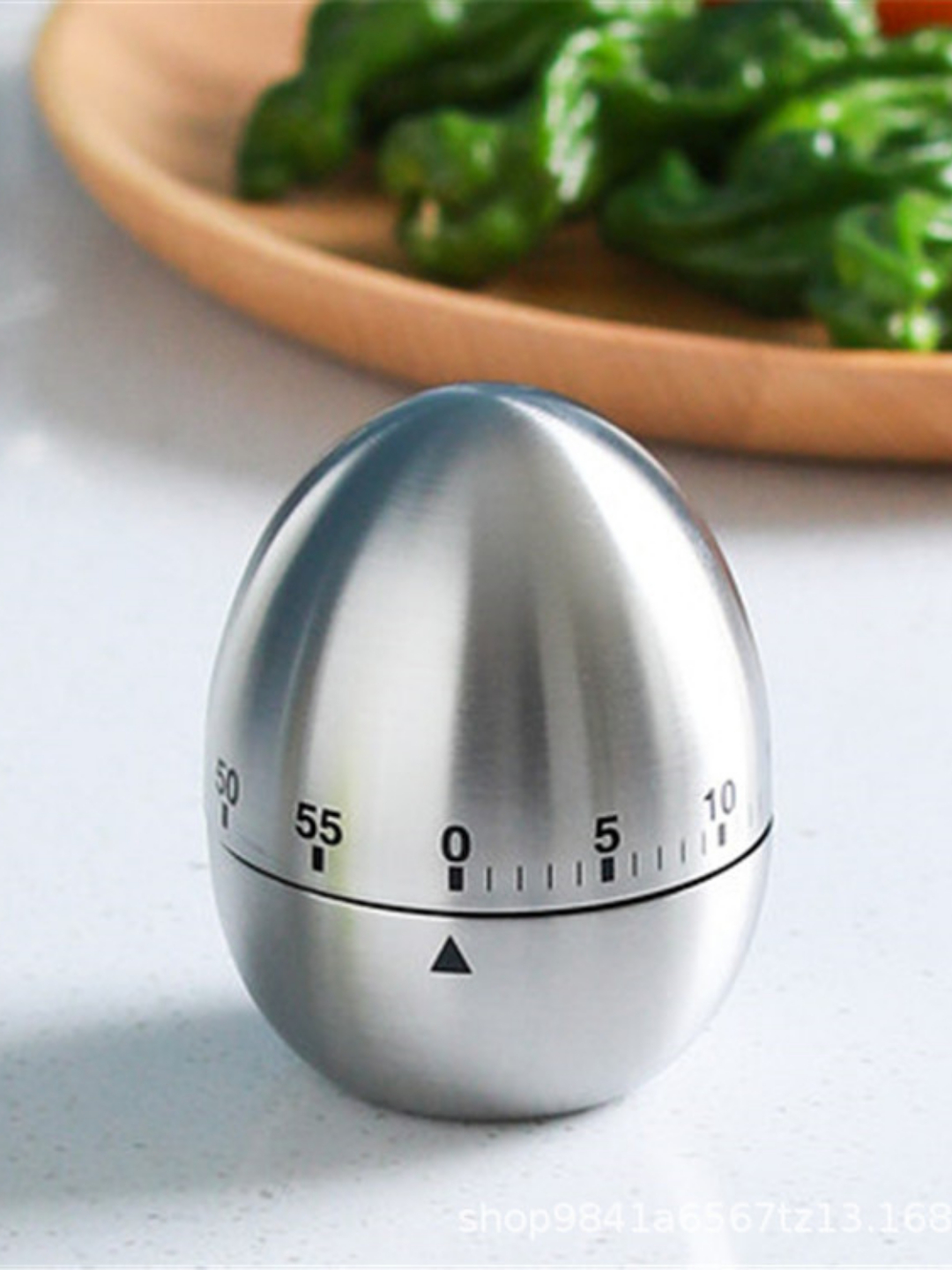 Механический кухонный таймер из нержавеющей стали — в форме яйца