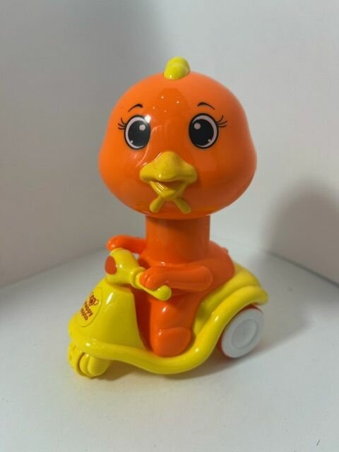 Заводная игрушка животные на мотоцикле