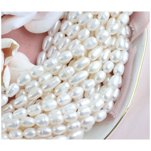 Жемчуг речной натуральный Рис 10-13 мм Нить 38 см 1550₽