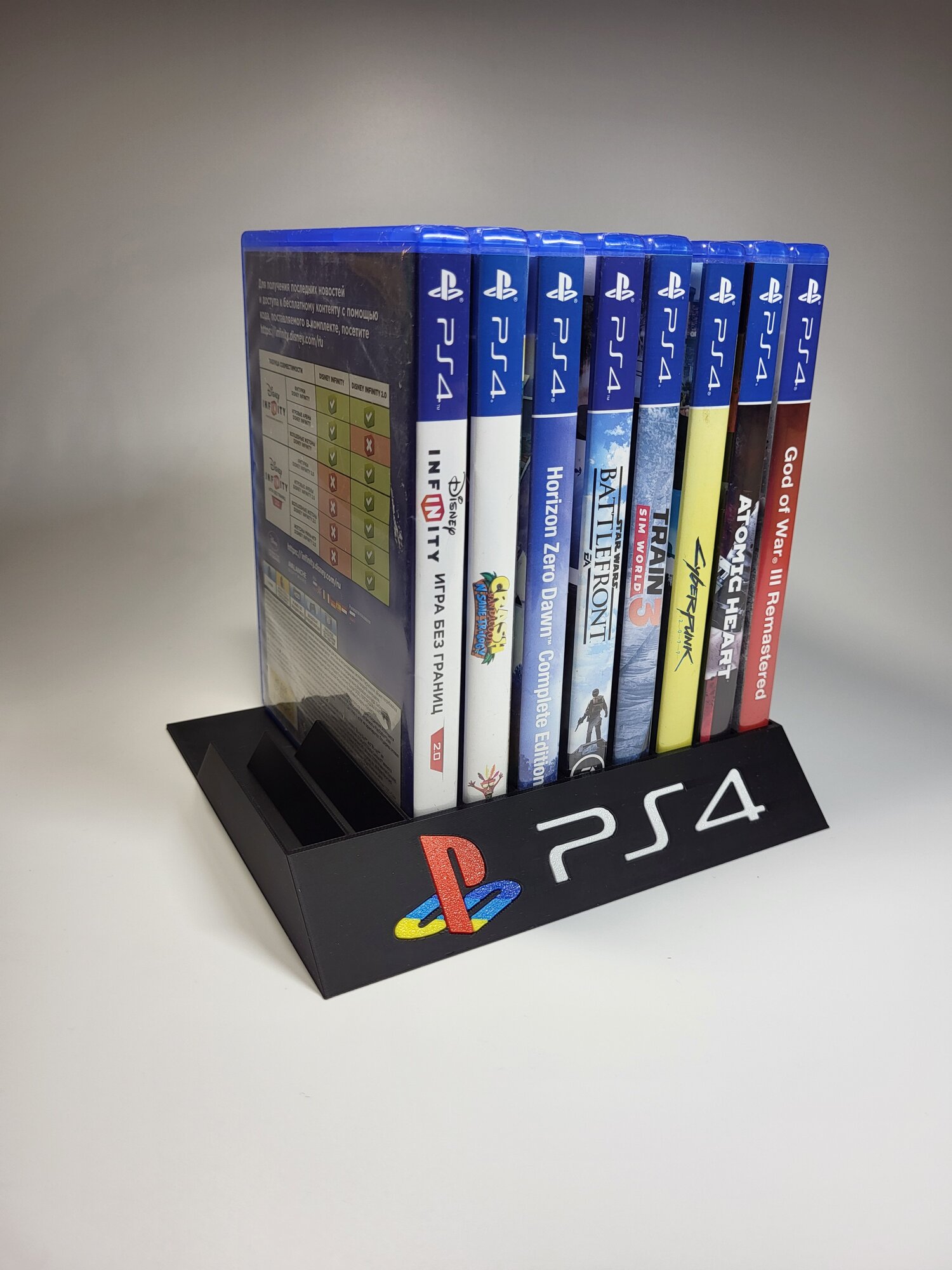 Подставка для игр Sony Playstation 4/ PS4 черная с цветным логотипом, на 10 дисков