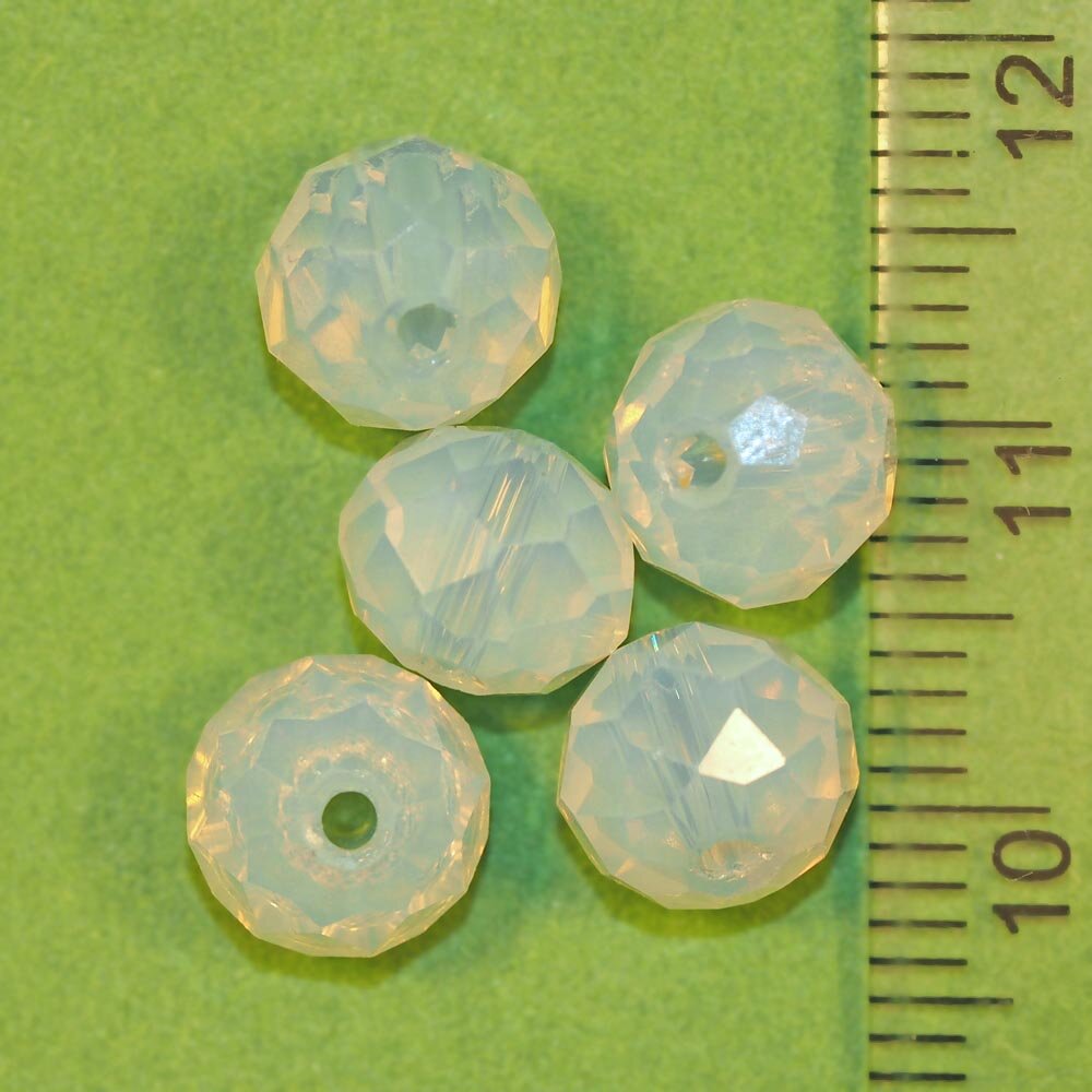 Натуральная бусина Лунный камень 0011217 бутон граненый 8х5.5 мм, цена за 10 шт.