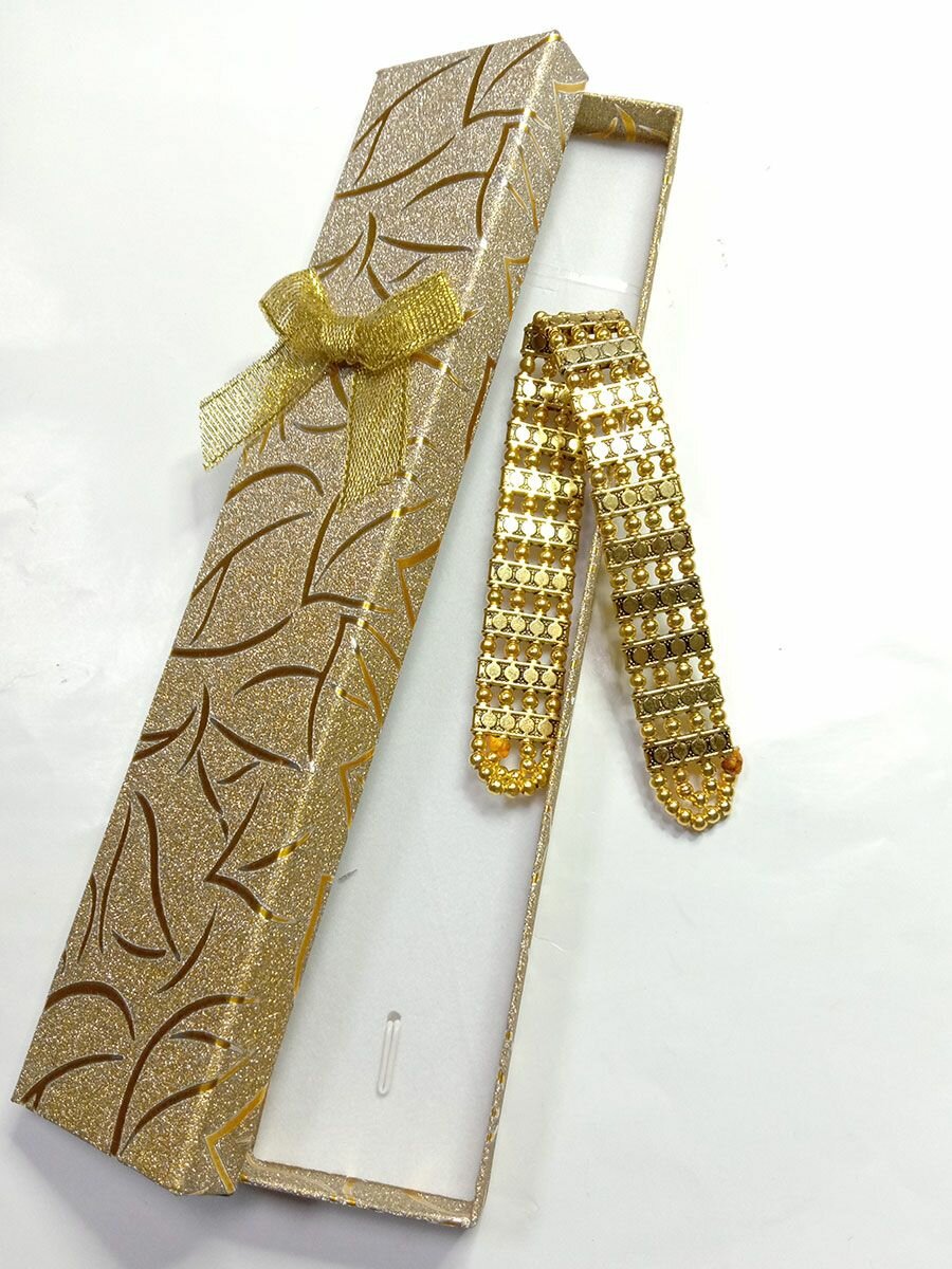 Перекидные четки металлические золотого цвета, общая Длина 20 см. Ширина 06 см. Толщина 04 см. Четки собраны в ручную для подарка любимому человеку. Четки укомплетованы в подарочной коробочке