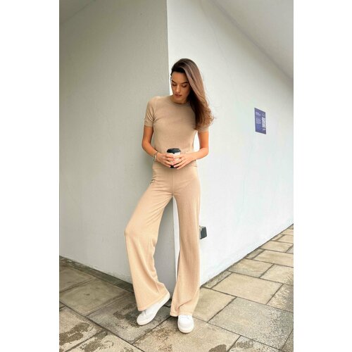 фото Брюки клеш charmstore, размер xs, бежевый