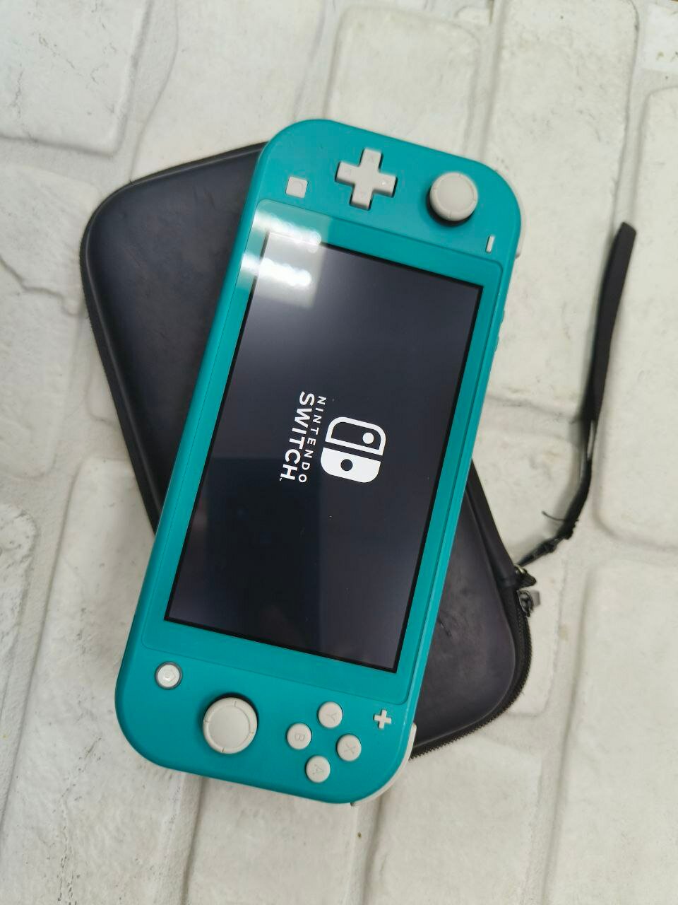 Игровая приставка Nintendo Switch Lite 32 ГБ, бирюзовый