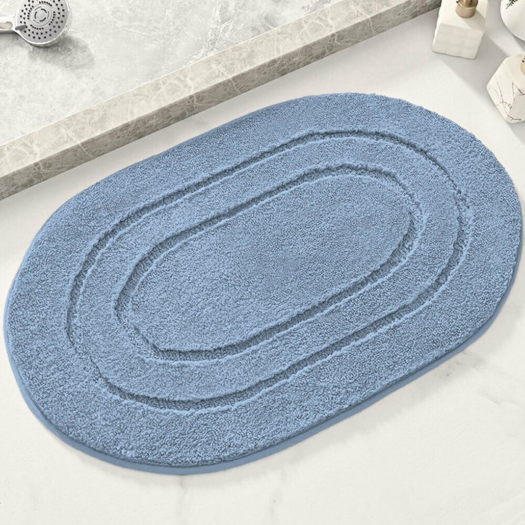 Коврик овальный для ванной 60x90см голубой полиэстер/резина мягкая поверхность