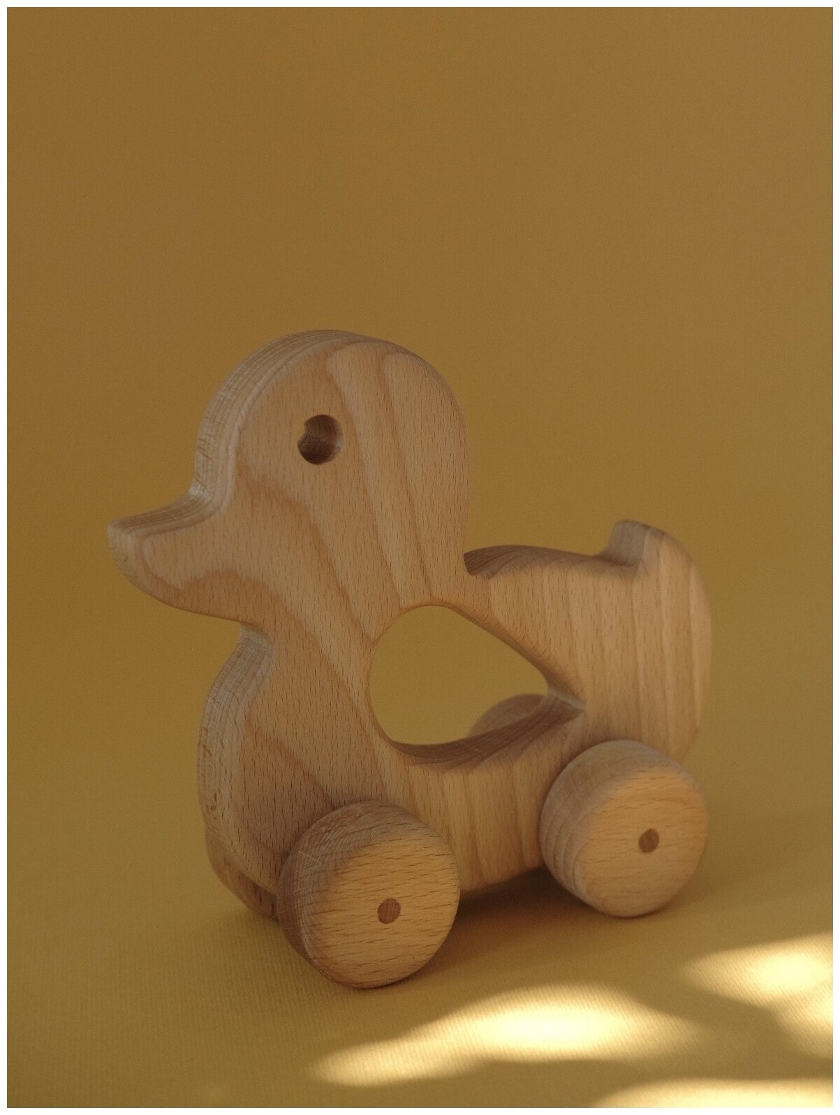Игрушка деревянная каталка уточка Эмма KAZA