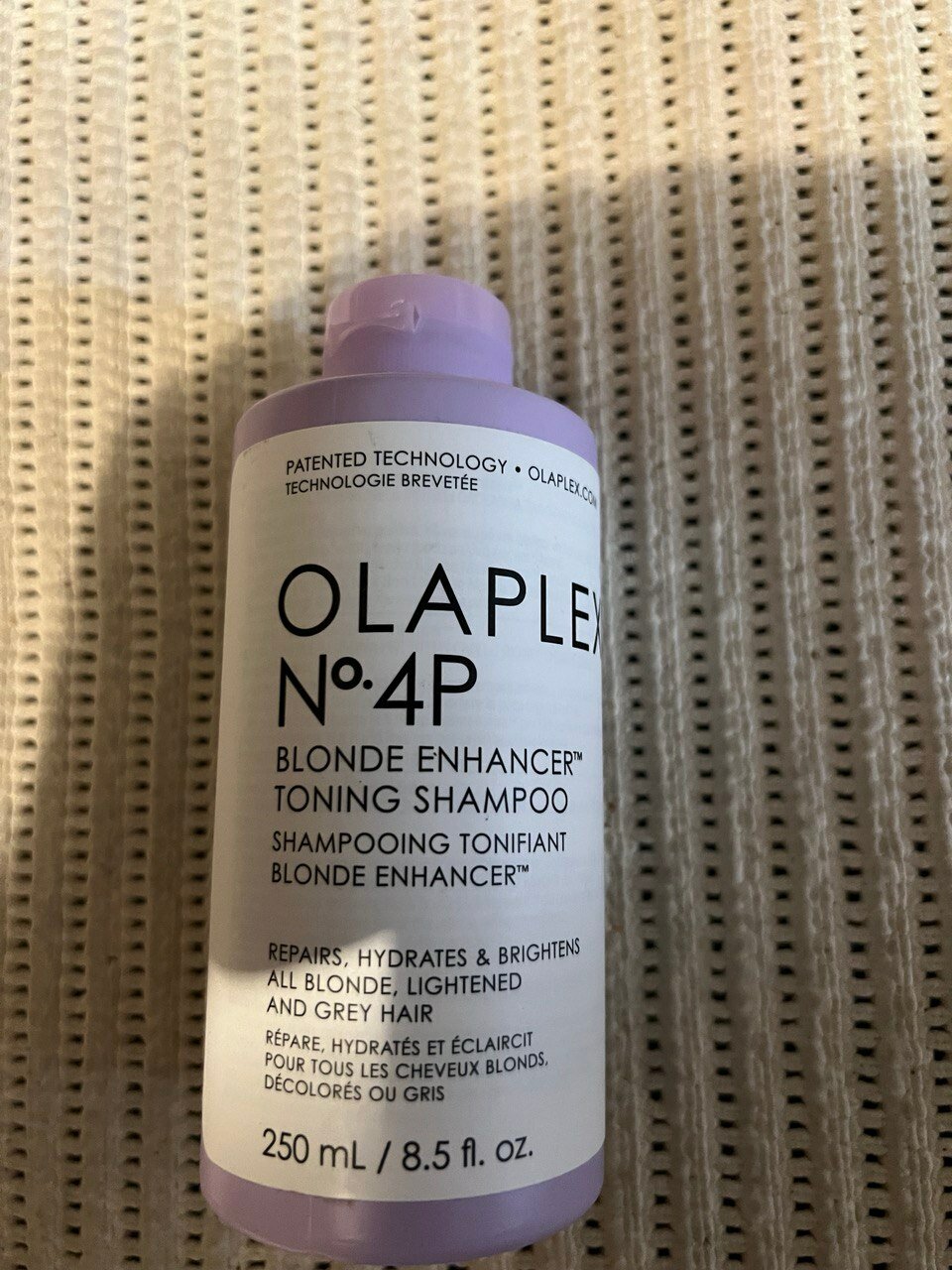 OLAPLEX шампунь N 4P Blonde Enhancer Toning Система защиты для светлых волос, 250 мл