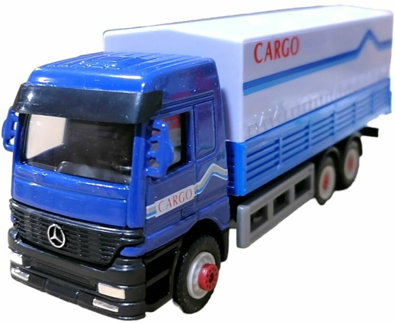 Игрушка модель "Грузовик тентованный CARGO" 99610A Welly