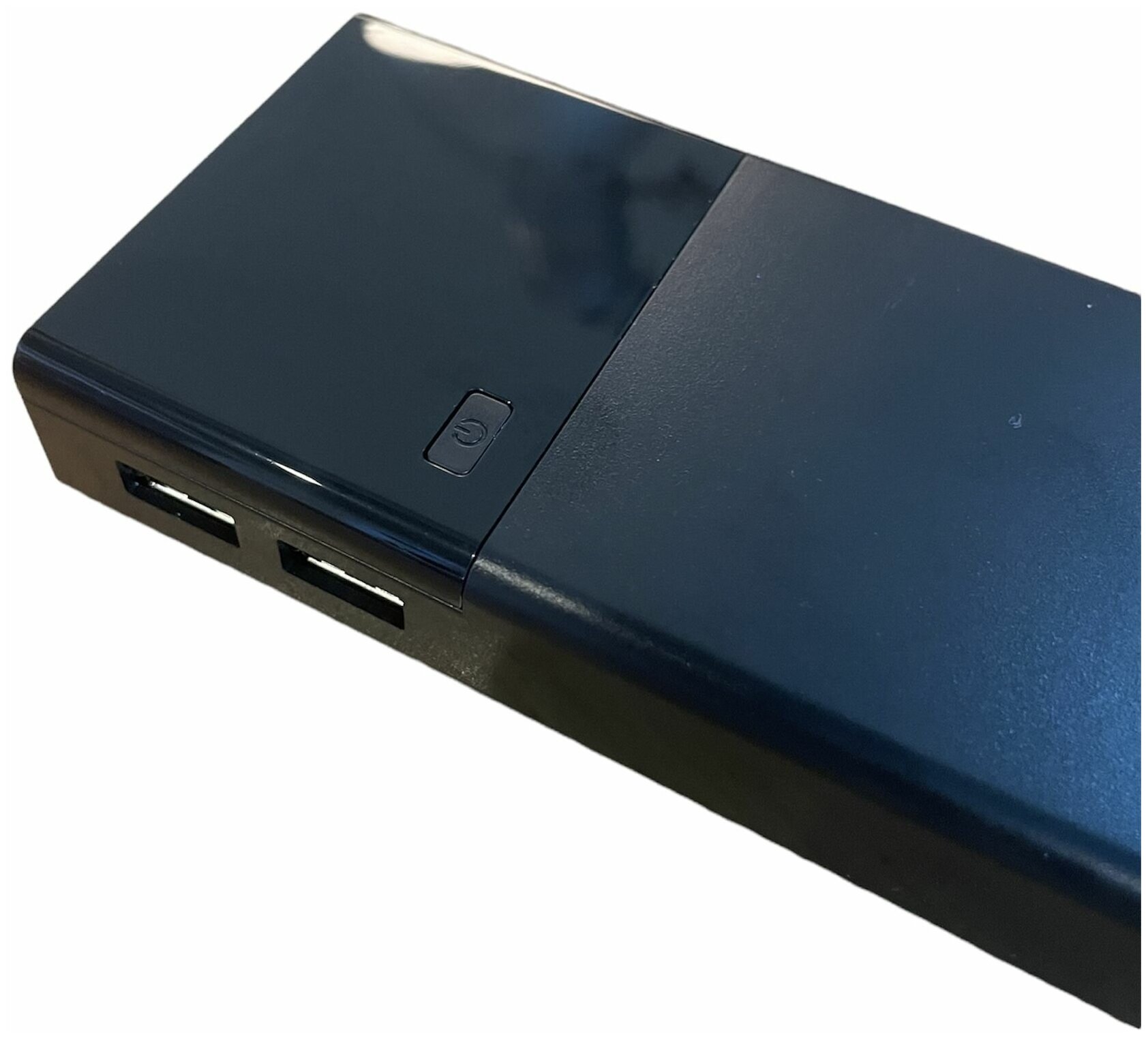 Внешний аккумулятор (Power bank) 2 USB Demaco DKK-006 20000 mAh(черный) с фонариком