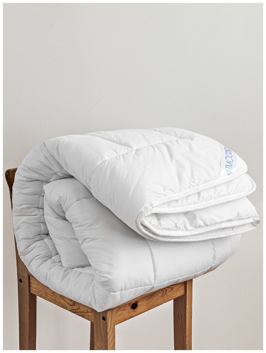 Одеяло 1,5 спальное лебяжий пух 142х205 гипоаллергенное - фотография № 10