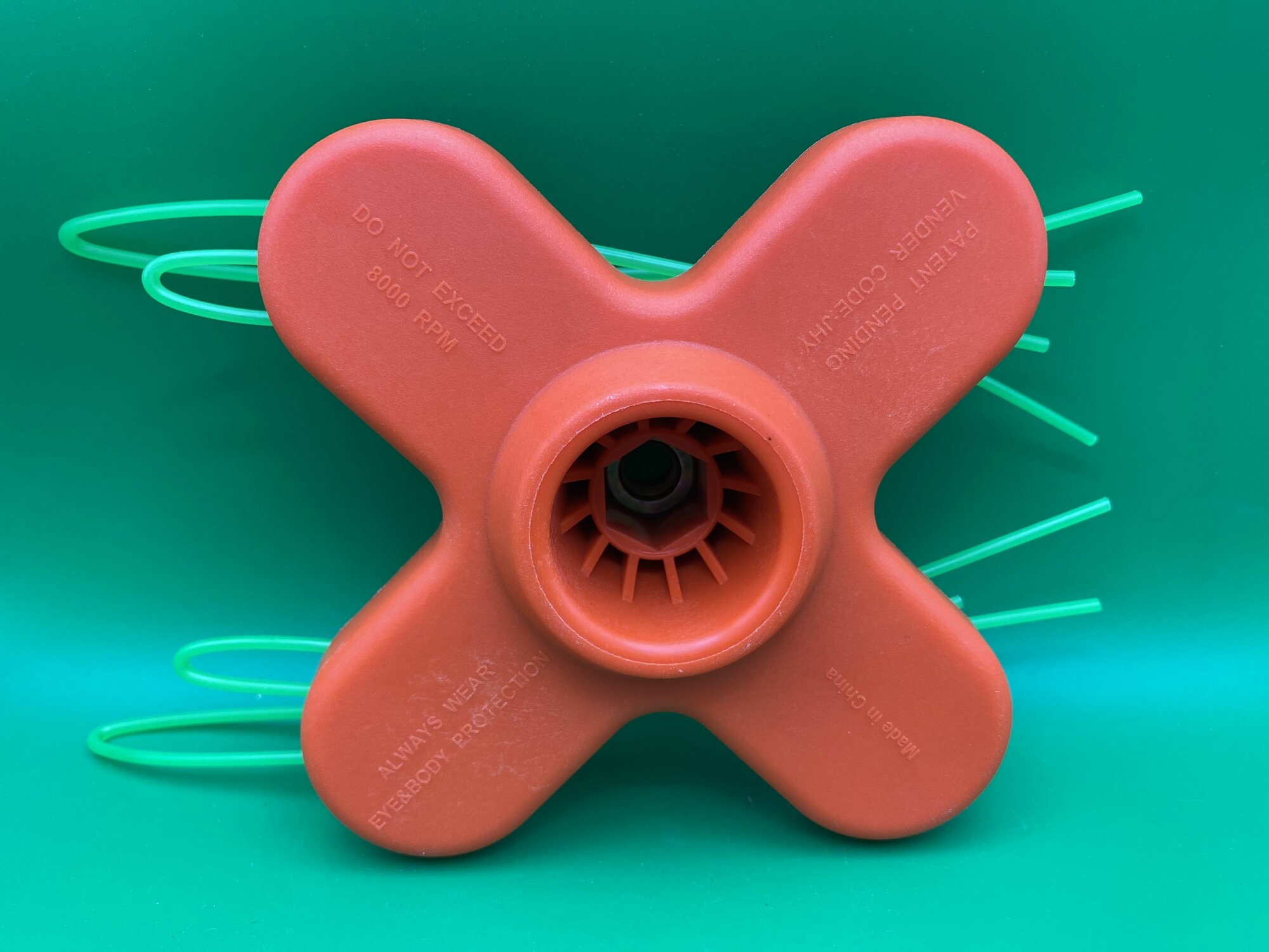 Катушка для триммера c вращающимся держателем лески (4-х лопастная) — фото 1